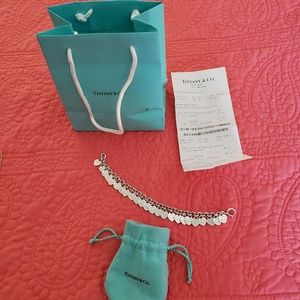 Genuine 9.25 sterling Tiffany multi heart bracelet
